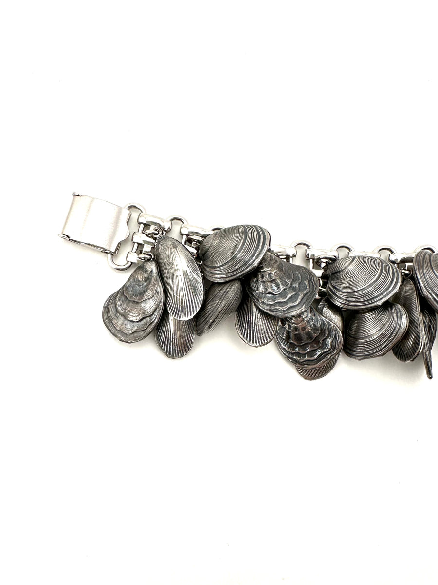Napier 1950s Antiqued Silvertone Shell Charm Bracelet