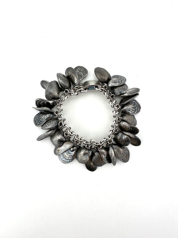 Napier 1950s Antiqued Silvertone Shell Charm Bracelet
