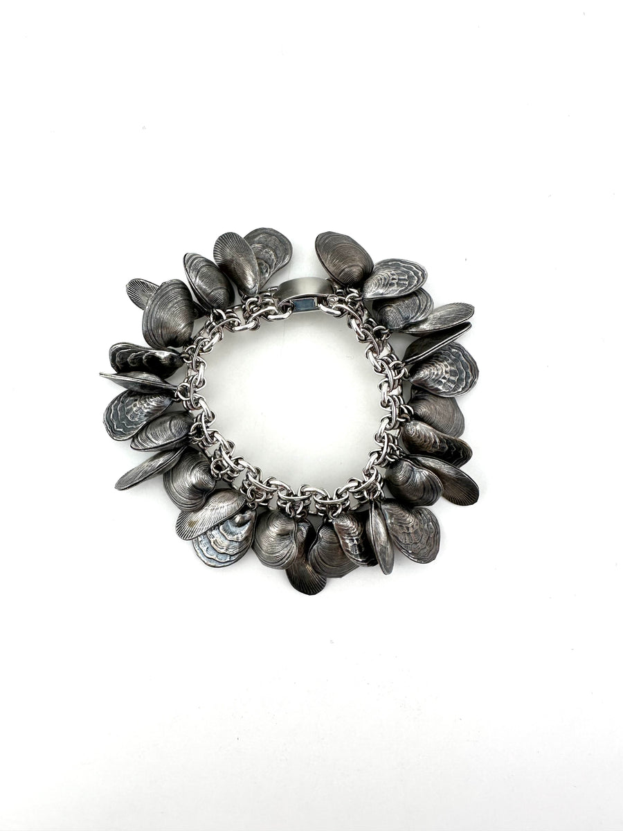 Napier 1950s Antiqued Silvertone Shell Charm Bracelet