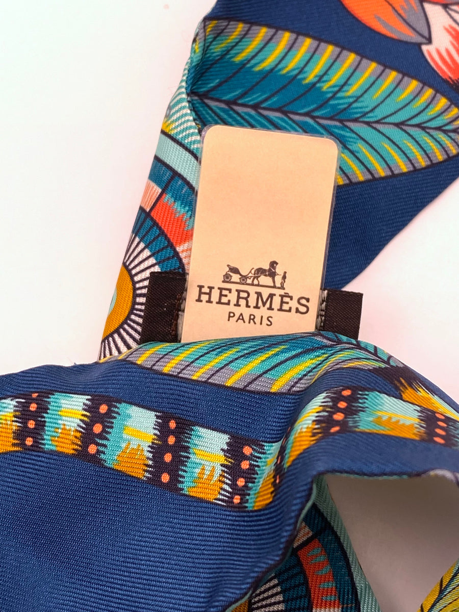 Lot 140 - A 'Tribord' silk scarf by Hermès, designed